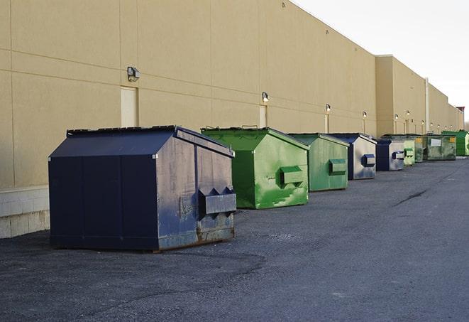 waste collection receptacles placed near a worksite in Livingston